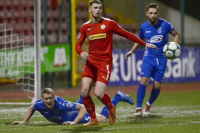 Cliftonville's Rory Donnelly and Dungannon's David Armstrong