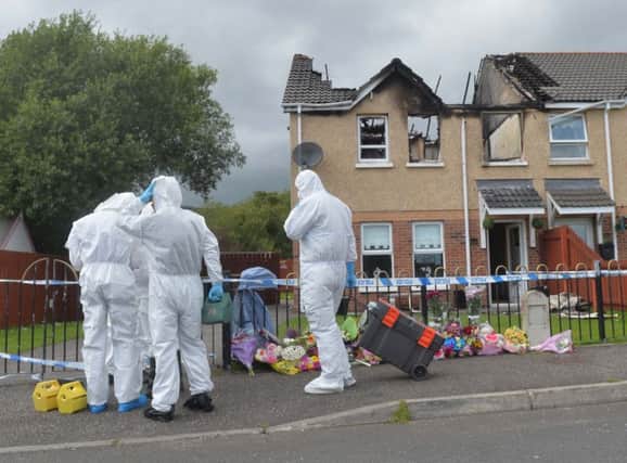 Police Forensics carry out fresh searches at the scene in Hazel View, Lagmore in 2015. 
Pic Colm Lenaghan/Pacemaker