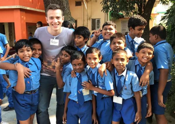 Peter Johnston with pupils at the Emmanuel Ministries school in Kolkata.