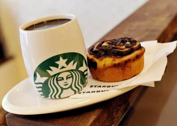 A Starbucks coffee and a Danish pastry. File photo by Nick Ansell/PA Wire