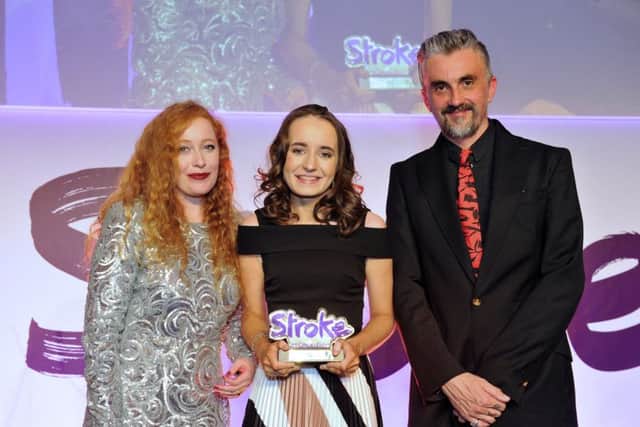 Rebecca Morrow (centre) was presented with her award by comedian Markus Birdman and actress Victoria Yeates.
