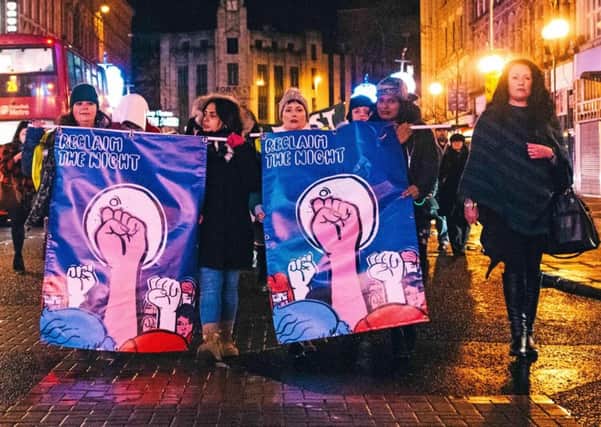 Women marching in Belfast for the annual Reclaim the Night march, demanding safer streets and an end to gender-based violence and abuse. Photo: PA