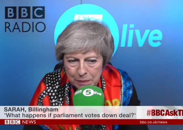 Video grab taken from BBC News of Prime Minister Theresa May taking calls on the BBC News Channel and BBC Radio 5 Live in a special programme presented by Emma Barnett. PRESS ASSOCIATION Photo.