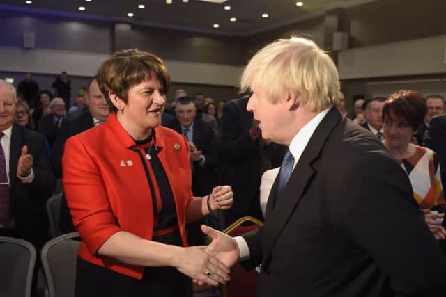 Boris Johnson and DUP Party leader Arlene Foster during the DUP annual conference at the Crown Plaza Hotel in Belfast.