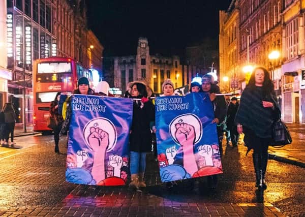 Campaigners pictured for the Reclaim the Night event in Belfast on Saturday.