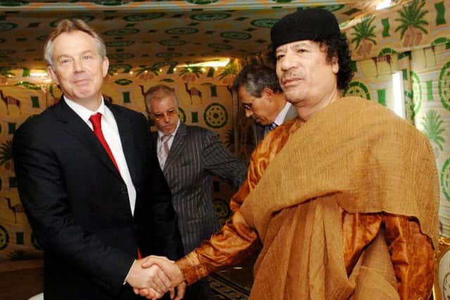 Former prime minister Tony Blair meeting Libyan leader Colonel Gaddafi at his desert base outside Sirte, south of Tripoli in May 2007