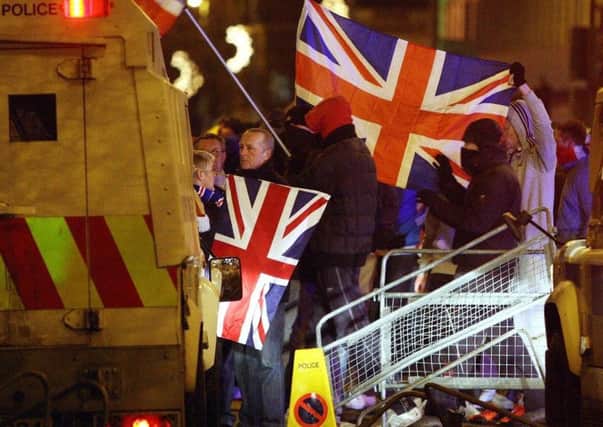 Loyalist protesters during the 2012 flags dispute, sparked when Belfast City Council decided to fly the Union Flag only on designated days