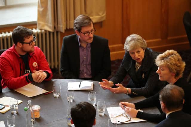 Prime Minister Theresa May meets with young farmers and students at Queen's University in Belfast, during her visit to Northern Ireland