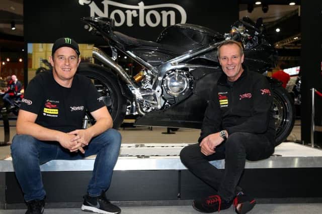 John McGuinness and Norton Motorcycles CEO Stuart Garner at Motorcycle Live at the NEC in Birmingham.