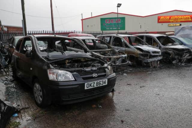 Damaged cars following an arson attack at a garage in the Woodburn Road area of Carrickfergus. 

Picture: PressEye