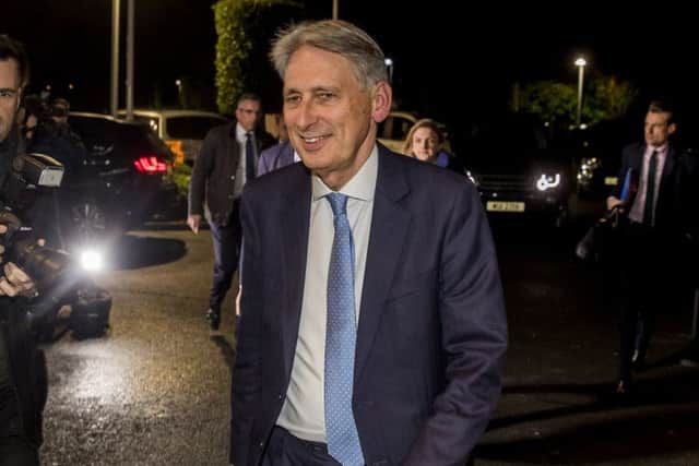 Chancellor of the Exchequer Philip Hammond arrives at the Crown Plaza Hotel in Belfast last Friday for a private dinner with DUP leader Arlene Foster