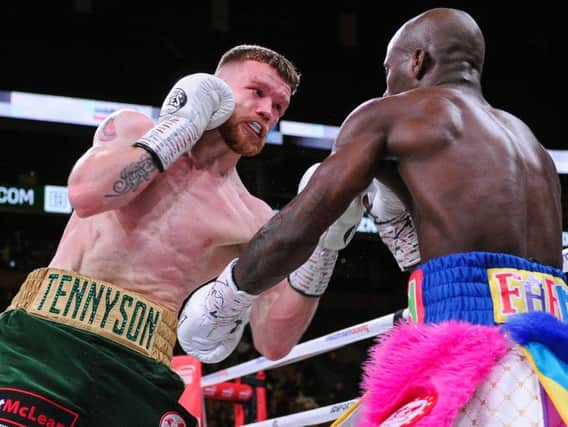 James Tennyson in action with Tevin Farmer