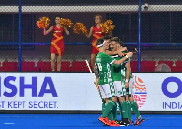 Ireland's Shane O'Donoghue celebrates his goal with teammates at the 2018 Odisha Hockey Men's World Cup in India. Pic by INPHO.