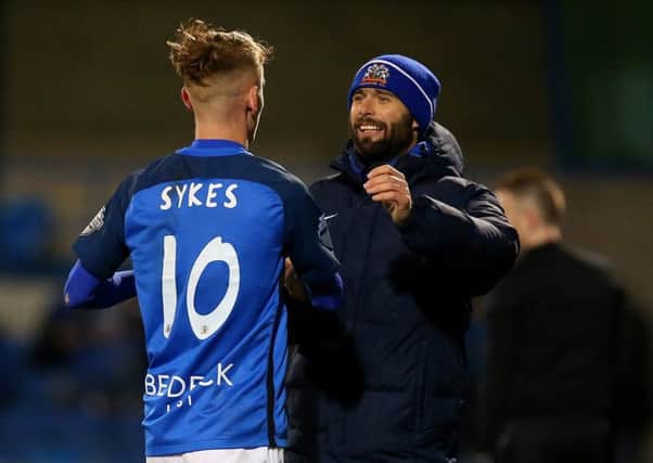 Glenavon's Mark Sykes and manager Gary Hamilton following victory on Friday over Coleraine. Pic by Pacemaker.