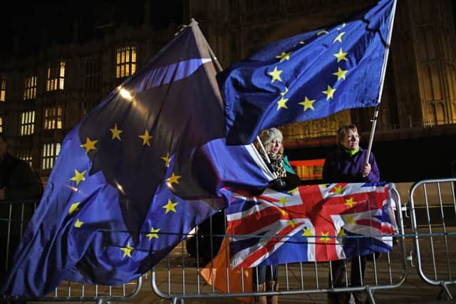 Protesters outside the Houses of Parliament in Westminster. Photo: David Mirzoeff/PA Wire
