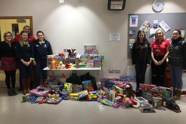 Co Antrim Young Farmers Clubs donating toys for Cash 4 Kids Mission Christmas Appeal