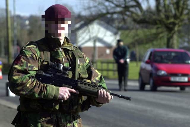 A British paratrooper pictured on the streets of Northern Ireland in 2001. (Photo: Pacemaker)
