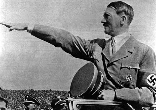 Adolf Hitler in 1934, the year after taking power. The letter-writer says that using rhetoric of us-versus-Germany is not appropriate today