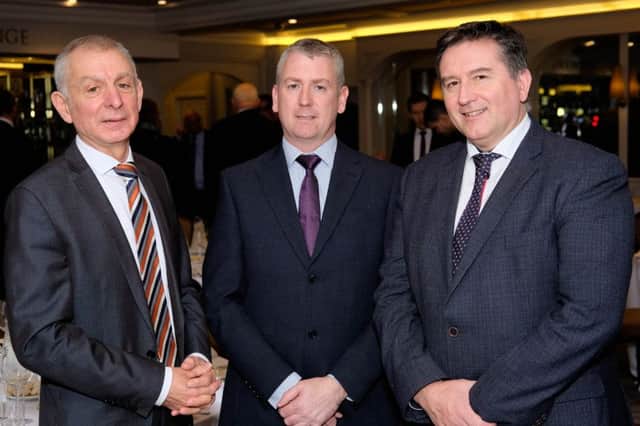 Conall Donnelly, right, Executive Director, NIMEA, guest speaker at the NIGTA lunch is pictured with Robin Irvine, left, Chief Executive, NIGTA and Declan Billington, NIGTA past President. Photograph: Columba O'Hare/ Newry.ie