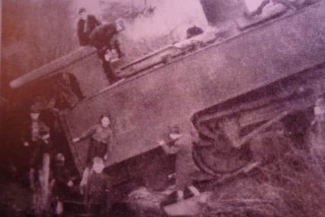 Local boys playing on Ballycastle's runaway train, 1943