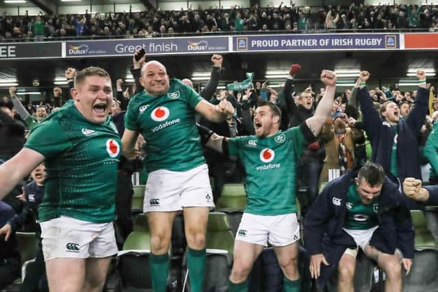 Ireland celebrate winning against New Zealand for the first time in Dublin