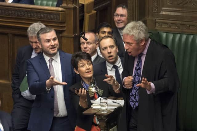 MPs including Health Secretary Matt Hancock (centre) urging Commons Speaker John Bercow to look at a video clip of Jeremy Corbyn on a mobile phone as points of order are raised following Prime Minister's Questions in the House of Commons, London. The Labour leader became embroiled in a misogyny row after being accused of mouthing "stupid woman" at Prime Minister, Theresa May during Prime Minister's Questions, which he denied. Photo: UK Parliament/Mark Duffy/PA Wire