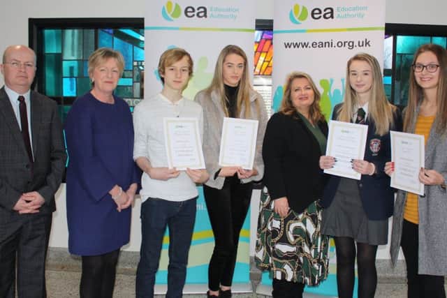 Pictured (l-r) Phillip Archibald EA Senior EWO, Dr Clare Mangan EA Director of Children and Young People's Service, Matthew Petticrew Ballymena Academy, Allegra Shaw Slemish College, Sharon O'Connor EA Chair, Rebekah Catherwood Coleraine GS and Emma Kerr Ballycastle HS. Missing from the photo: Adam McCann Ballyclare SS, David Hogg and Lucy Millar Ballymena Academy, Ryan Guy Carrickfergus Academy, Caitlin Leslie Coleraine GS and Amy Boyle St Louis GS Ballymena.