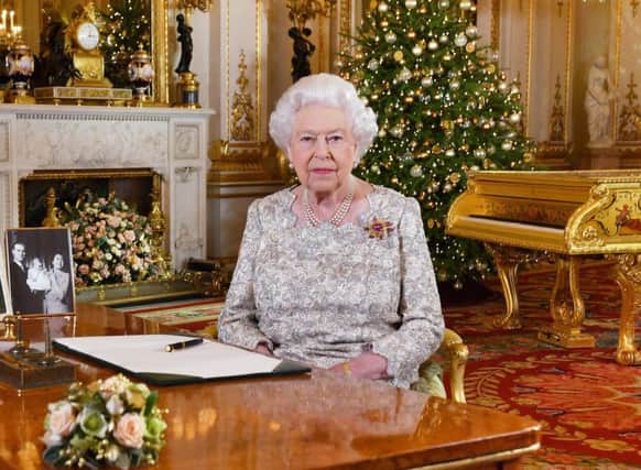 Queen Elizabeth II after she recorded her annual Christmas Day message, in the White Drawing Room of Buckingham Palace in central London.: John Stillwell/PA Wire