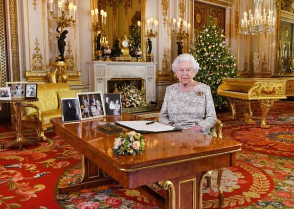 Queen Elizabeth II after she recorded her annual Christmas Day message, in the White Drawing Room of Buckingham Palace in central London. Photo: John Stillwell/PA Wire