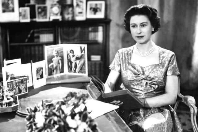 Queen Elizabeth II in the Long Library at Sandringham shortly after making her Christmas Day broadcast to the nation in 1957. The monarch made her first Christmas broadcast live on the radio in 1952 - the year of her accession - and the annual message was first shown on TV in 1957.  Photo: PA/PA Wire