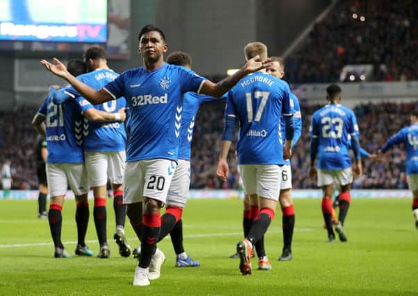 Alfredo Morelos sharing a moment with the fans following his goal for Rangers in the 1-1 draw against Hibs. Pic by PA Wire.