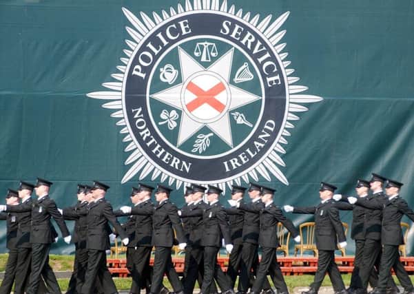 PSNI student officers on a march past as they graduate from the police training college at Garnerville in Belfast
