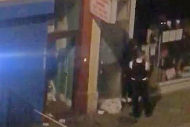 Still taken from video issued by an unnamed source of the scene at a property in Greyhound Road in Hammersmith, west London where thirty-nine people were arrested on suspicion of attempted murder following a incident in Fulham Palace Road. (P.A. Wire)