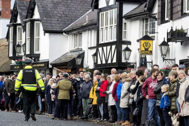 Local residents stand outside the Crawfordsburn Inn to watch the North Down New Year Hunt in Crawfordsburn, Northern Ireland. PRESS ASSOCIATION Photo. Picture date: Tuesday January 1, 2019. Photo credit should read: Liam McBurney/PA Wire