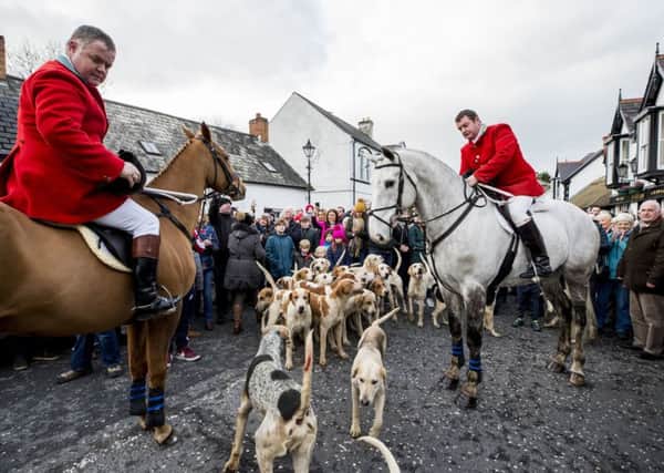 The Field Master (left) and Huntsman Master of the hunt prepare to start the North Down New Year Hunt in Crawfordsburn