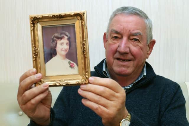 Maurice McHugh at his home in Dublin holds up a picture of his only child, Caroline, who died in the Stardust nightclub fire tragedy in 1981