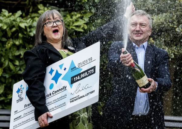 Frances Connolly, 52, and Patrick Connolly, 54, from Moira in Northern Ireland, who scooped a Â£115 million EuroMillions jackpot in the New Year's Day lottery draw, during a photocall at the Culloden Estate and Spa in Holywood, Belfast, as they announce their win. Photo: Liam McBurney/PA Wire