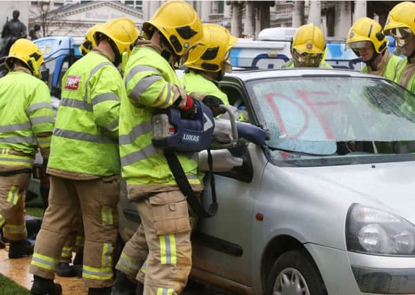 A car crash simulation at Belfast City Hall in October 2018, to drive home the road safety message to young people. Picture Pacemaker