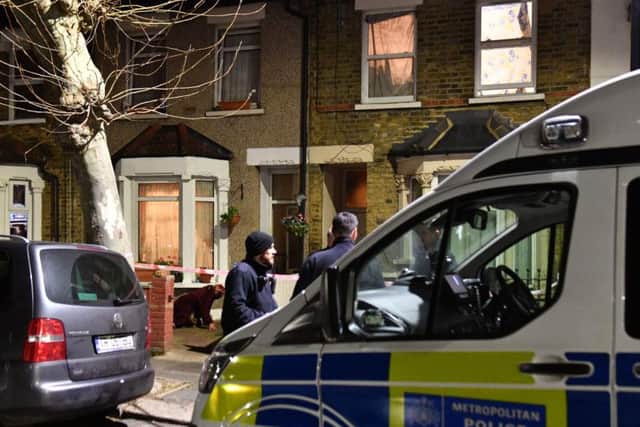 The scene in Nine Acres Close, Newham, east London, as police are searching for a 17-month-old girl, Maria Tudorica, who was abducted by a man as he stole her father's car.