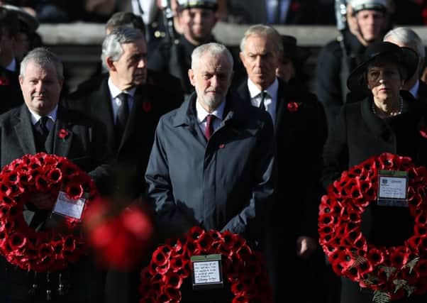 Jeremy Corbyn, centre, pictured during 2018's Armistice commemoration