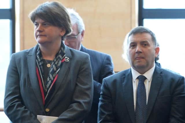Arlene Foster and Robin Swann. The UUP membership does not favour a merger between the parties