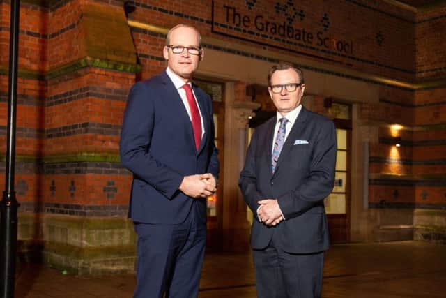 Ireland's Foreign Affairs Minister Simon Coveney (left) meets Vice Chancellor Prof. Ian Greer following his speech at Queen's University Belfast. Pic by Brendan Digney/PA Wire