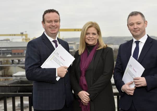 Manufacturing NI CEO Stephen Kelly, left, with Tughans corporate partner James Donnelly and Maureen Treacy, of Perceptive Insights pictured at the launch of the latest industry survey