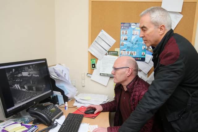 Sinn Fein MP Paul Maskey(left) and Pat Sheehan MLA pictured watching the CCTV footage. 

Picture by Jonathan Porter/PressEye