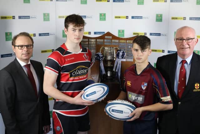 Jon Woods, Lurgan College, and Andrew Miller, Foyle College with Richard Caldwell, Danske Bank and Stephen Elliot, Ulster Rugby.