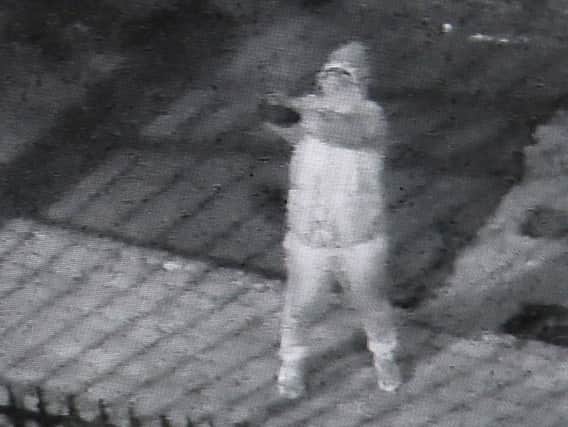A still image taken from the CCTV footage that appears to show a gunman shooting at the