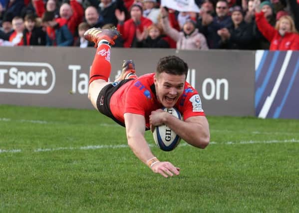 Ulster's Jacob Stockdale goes over for a try against Racing 92