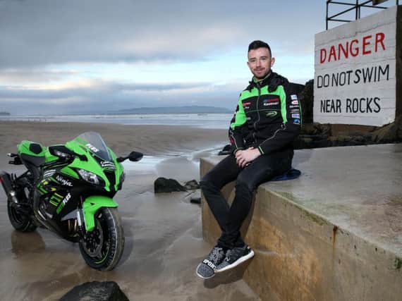 Kawasaki rider Glenn Irwin pictured at Portstewart Strand. The Carrick man will return to the North West 200 again in May.