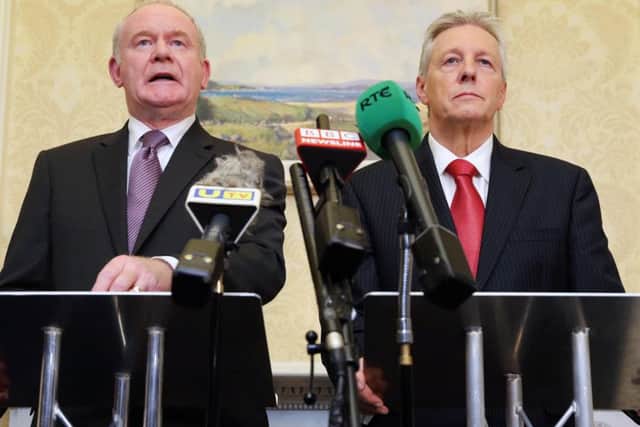 Martin McGuinness (left) and Peter Robinson at a press conference after the signing of the Fresh Start agreement in November 2015
