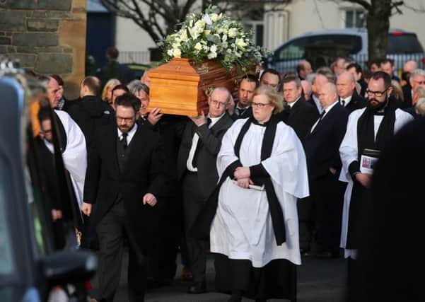 The funeral of Robert Robinson at Holy Trinity Church in Banbridge.  The 64-year-old former senior RUC officer died on Sunday after an incident in the Mourne Mountains, Co. Down,

Mr Robinson's coffin is carried from the church after the funeral service. 

Picture by Jonathan Porter/PressEye